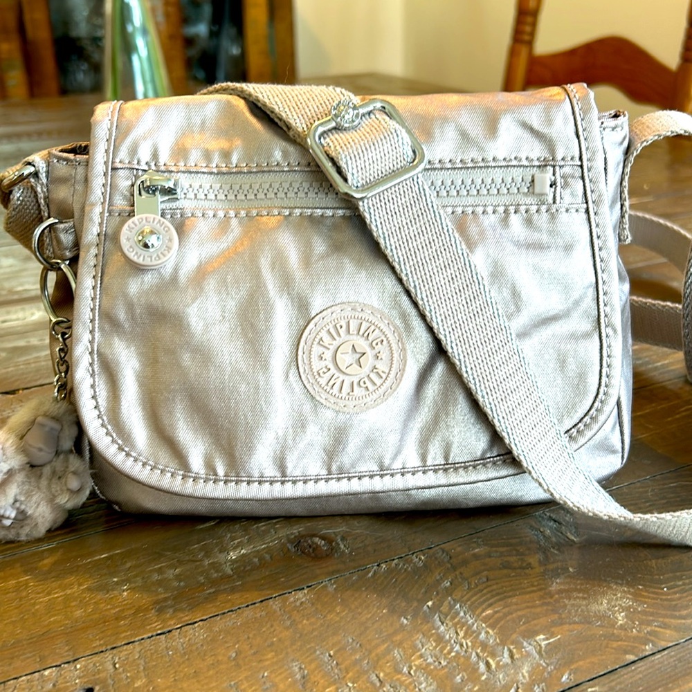 Authentic Kipling Mini Crossbody bag in metallic pewter.